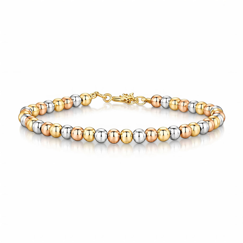 Dreireihiges Perlenarmband mit Kugelperlen in Gold-, Silber- und Rosé-Tönen