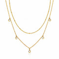 Goldfarbene Halskette mit drei Lagen und runden Strass-Anhängern, 18K vergoldeter Stahl