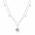 LUCIA Layering-Kette aus Edelstahl mit mehreren runden Anhängern und Sonne-Motiv