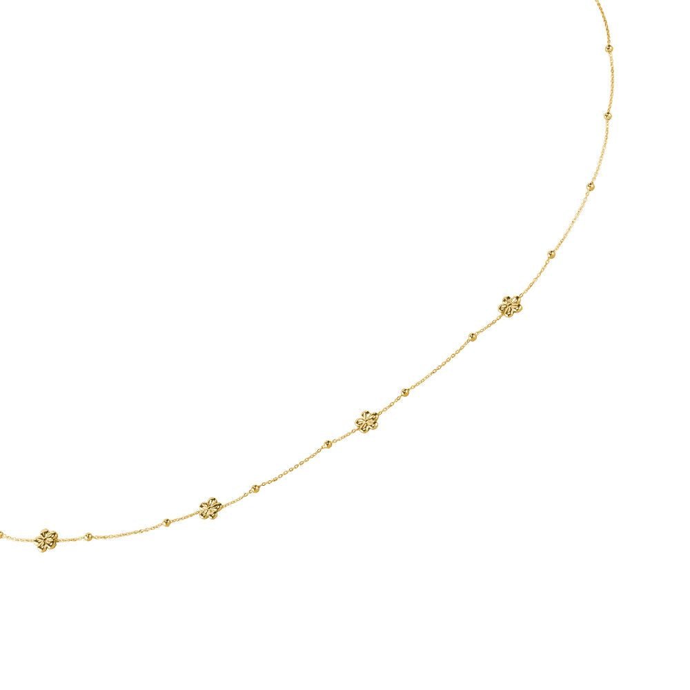 Goldfarbene Körperkette mit Blüten-Details entlang der Glieder, feiner Kettensteg