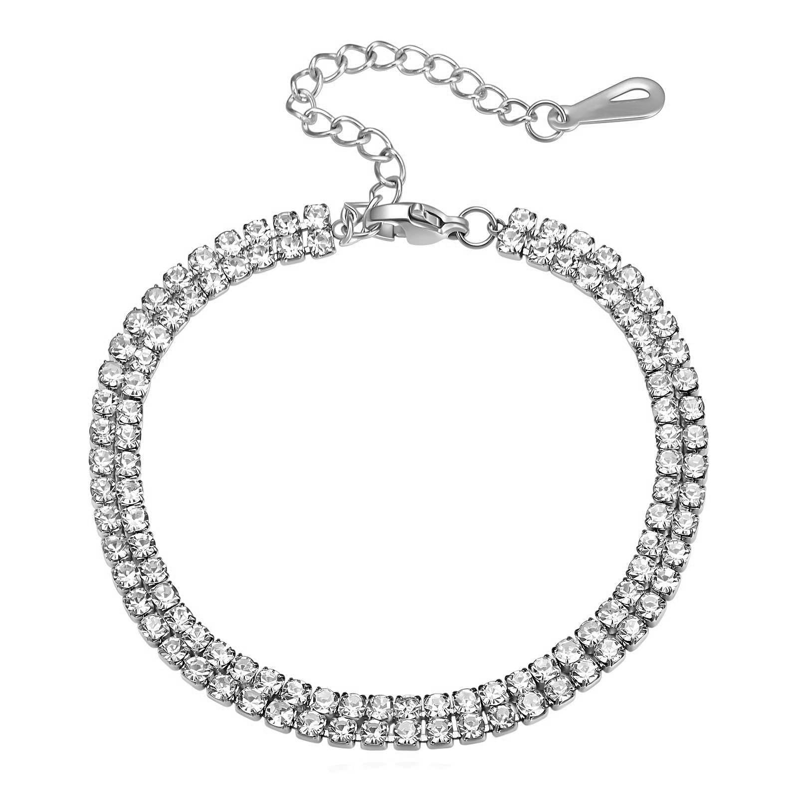 Silberfarbenes Tennisarmband mit Strassstein-Reihen und Kettenverschluss.